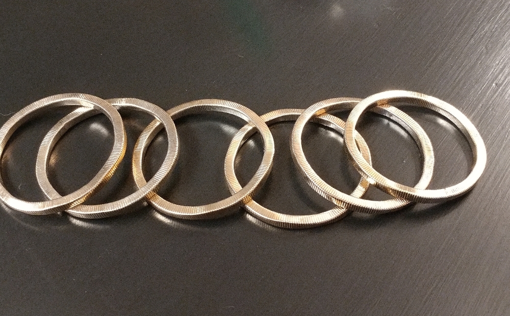 6 stretchable goldtone bangle bracelets